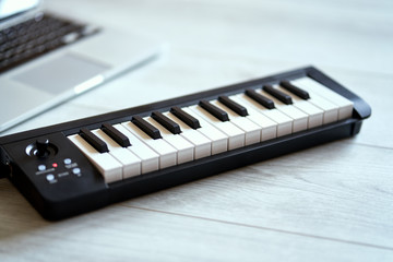 keyboard musical instrument on a white floor © superelaks
