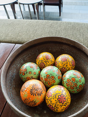Colorful ball sphere in ceramic bowl as decoration in the resort