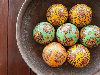 Colorful ball sphere in ceramic bowl as decoration in the resort