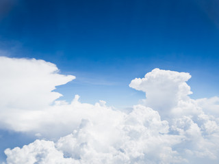 Naklejka na ściany i meble View of blue sky background with white cloud