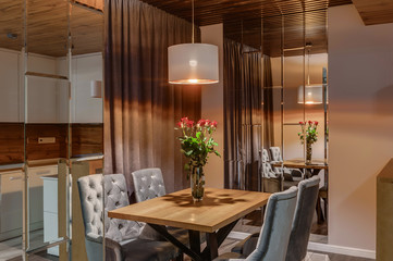 Fototapeta na wymiar Interior of the apartment in a contemporary style. Kitchen studio