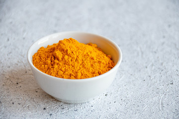 spices curcuma in a bowl
