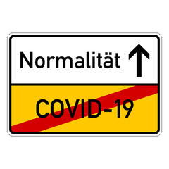 city sign with text covid-19 normalitaet
