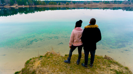 Fototapeta premium man and woman by the lake