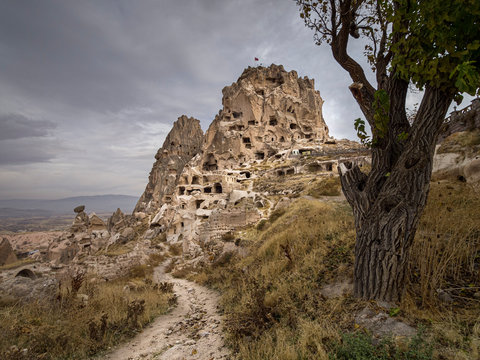 Cave houses carved in tuff in the beautiful landscape of Cappadocia in Turkey