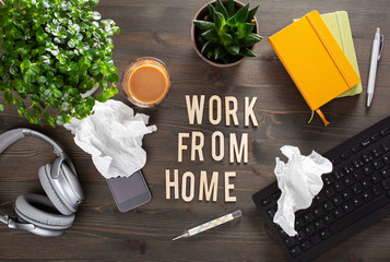 work from home text desk with keyboard computer smartphone notebook houseplants, workspace office at home