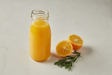 Fototapeta na wymiar orange juice in a bottle