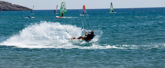 Obraz premium windsurfer in the sea action rhodos greece