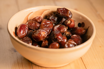 date fruits on wooden table