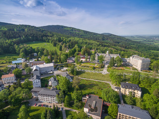 Aerial view of town Jesenik area with hills and nature.