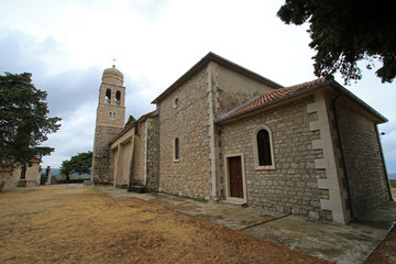 Fototapeta na wymiar Church of St. Anton Opat in Vrisnik village, Hvar island, Croatia