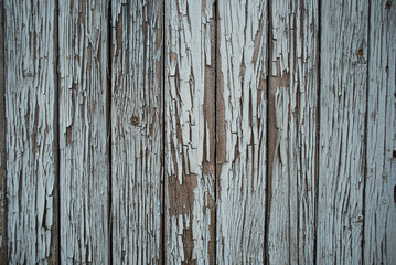 Bright wooden fence of separate wooden bars