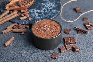 Cup of hot chocolate on table