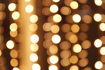 Christmas lights bokeh yellow background texture