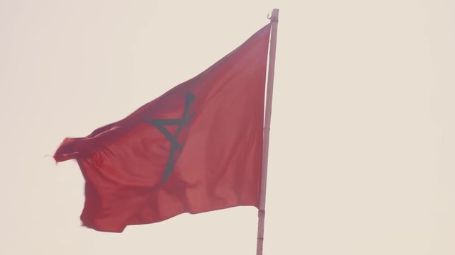 Moroccan flag waving in the wind