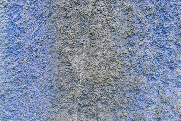 Old blue damaged wall. Color abstract grunge background.