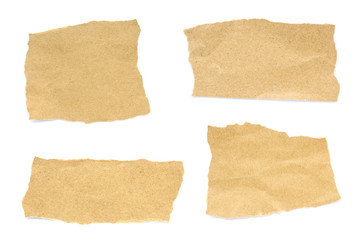 Recycled paper craft stick on a white background. Brown paper torn or ripped pieces of paper isolated on white background.