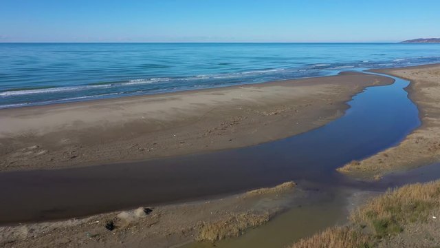 river outfall at the ocean