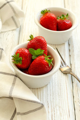  fresh strawberries on wooden background