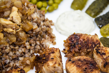 Delicious chicken skewers from fillet on a white plate. Healthy and tasty  food with chicken meat.