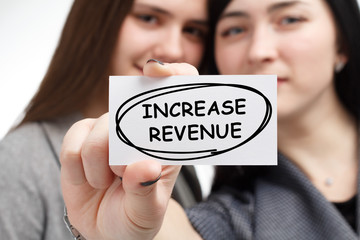 Business, technology, internet and network concept. Young businessman shows a keyword: Increase...