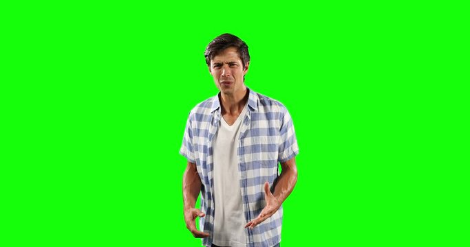 Front view of Caucasian man confusing with green screen