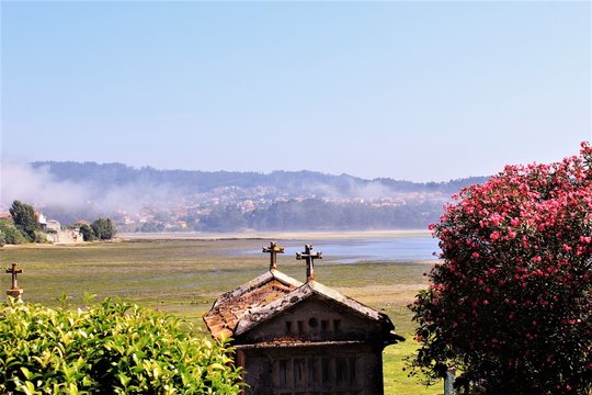  Horreos with beautiful seascape morning fog over the sea  in Combarros,Pontevedra,Galicia,Spain