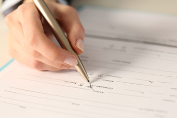 Woman hand filling out form checking yes box