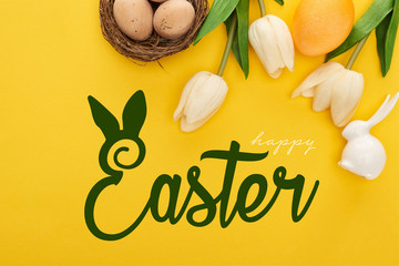 top view of tulips and chicken eggs in nest near Easter bunny on colorful yellow background with happy Easter illustration