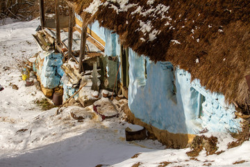
Inhabited old house in the Apuseni Mountains in winter, Romania