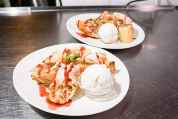 Delicious and sweet apple strudel and ice cream
