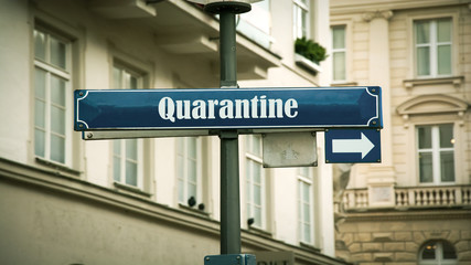 Obraz premium Street Sign to Quarantine versus Virus