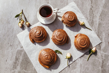 Cinnamon rolls and cream. Tea party. Still life.