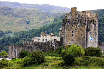 Fototapeta premium Dornie - Scotland, UK - August 13, 2018: Eilean Donan Castle, Dornie, Scotland, Highlands, United Kingdom