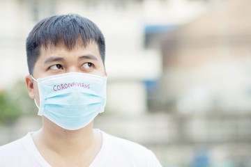 Men wear masks to protect against the Covid virus. 19 and battery