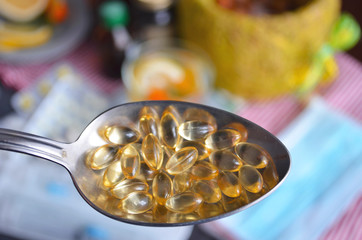 Pills and antiseptics of pharmaceutical medicine. Food to protect immunity. The concept of medicine, hygiene and healthcare. Coronavirus. top view, copy space. Face mask, surgical mask. Flu season.