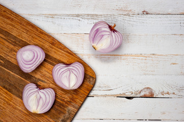 Red onion, lettuce. Health benefits, very rich in vitamins. Background for vegetables and garden plants and cooking.