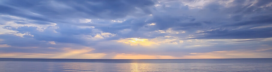 sky above water / texture background, horizon sky with clouds on the lake