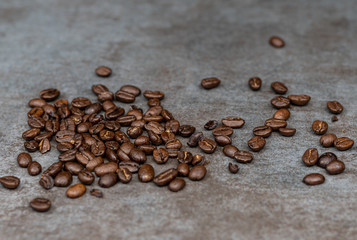 Coffee beans on grey background