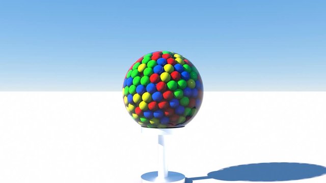 An abstract chewing gum apparatus quickly fills with colored balls.