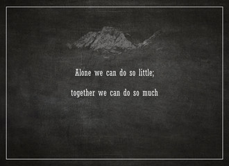 Alone we can do so little; together we can do so much written on a blackboard