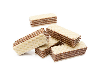 Crispy wafers with creamy hazelnut filling isolated on white background
