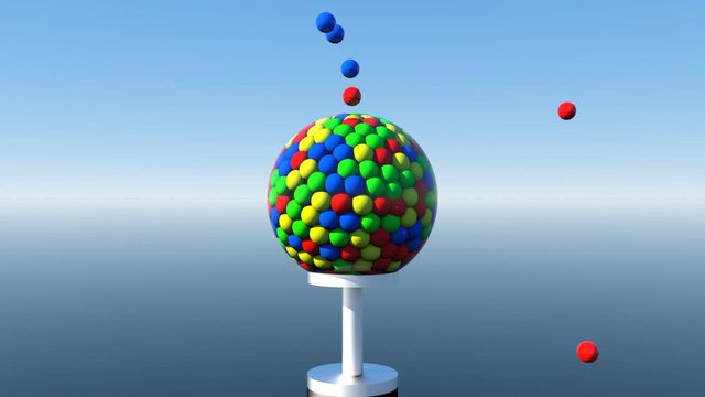 An overflowing chewing gum machine shoots with colored balls.