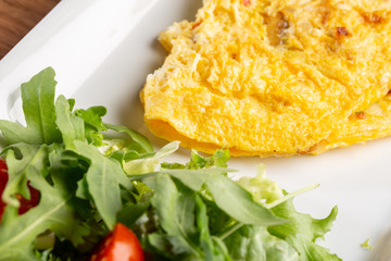 close up of fresh classic omlette with mushrooms