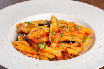 details of fresh pasta with tomato and veggie, italian style