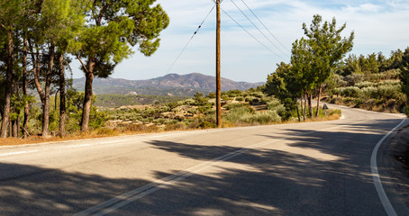 road in the park rhodos island greece