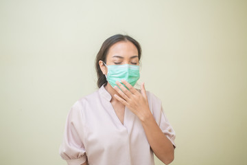 Women concerned about the Covid-19 virus And her mask
