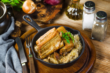 Traditional spare ribs baked in sauerkraut.