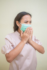 Women concerned about the Covid-19 virus And her mask