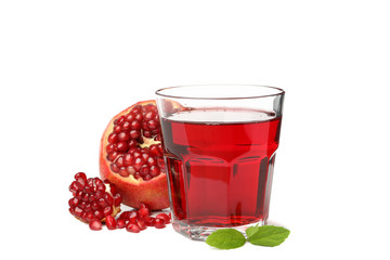 Pomegranate and glass of juice isolated on white background